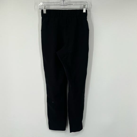 Lululemon On The Fly Pants Woven 27" in Black - Picture 5 of 9